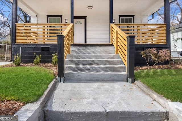 property entrance featuring a porch