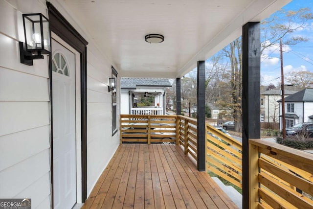 deck with covered porch