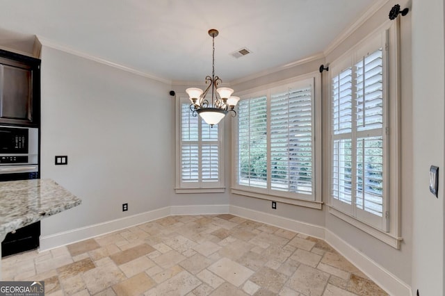 unfurnished dining area featuring ornamental molding, a wealth of natural light, and an inviting chandelier