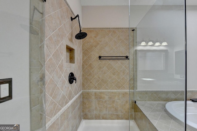 bathroom with independent shower and bath