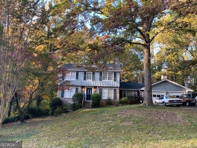 colonial house with a front lawn