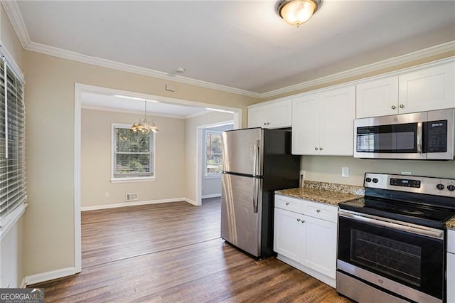 kitchen with dark hardwood / wood-style floors, white cabinetry, and appliances with stainless steel finishes