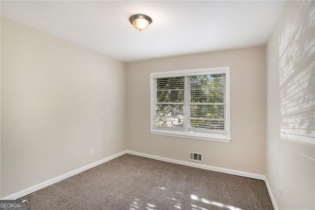 view of carpeted spare room