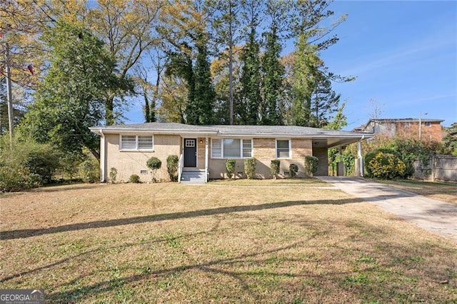 ranch-style house featuring a front yard and a carport