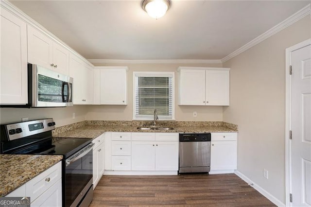 kitchen with light stone countertops, white cabinetry, sink, dark hardwood / wood-style flooring, and appliances with stainless steel finishes