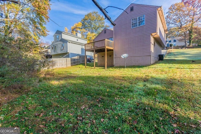 back of property with a balcony and a lawn