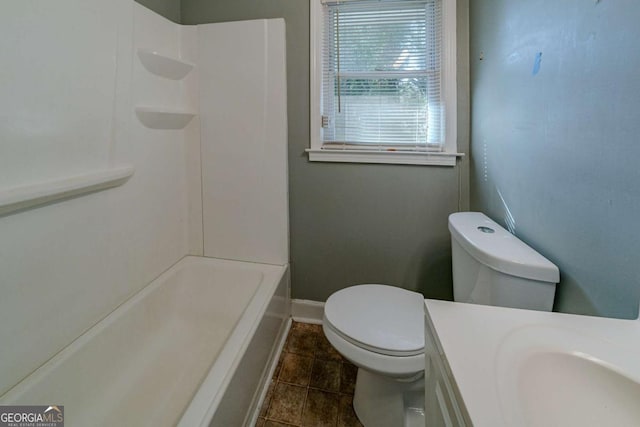 full bathroom with tile patterned flooring, vanity, tub / shower combination, and toilet