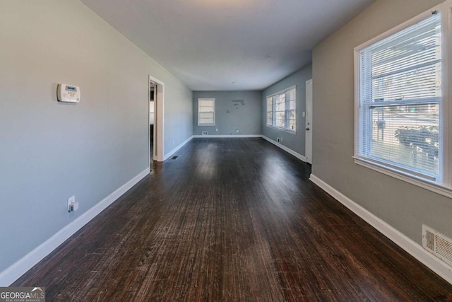 interior space with dark hardwood / wood-style flooring