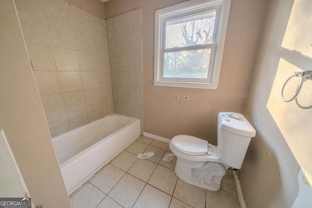 bathroom with tile patterned flooring and toilet