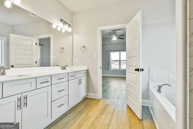 spacious closet with light wood-type flooring