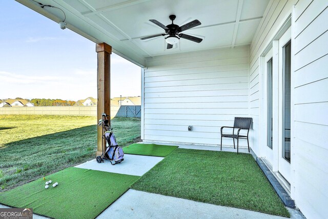 view of yard with ceiling fan