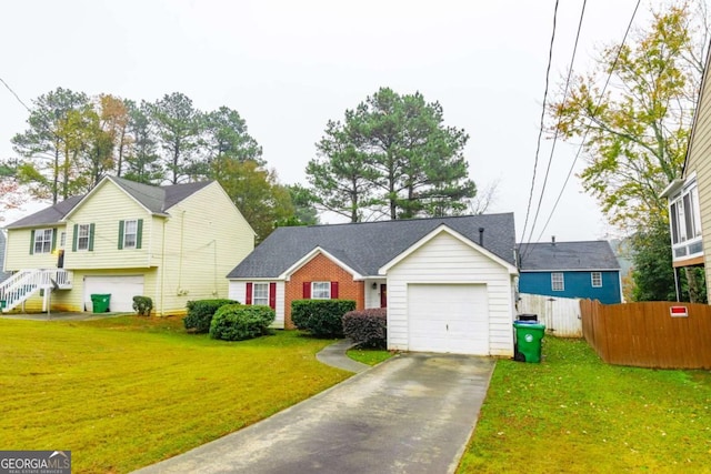 view of front of house featuring a front lawn and a garage