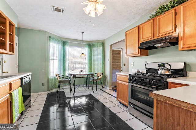 kitchen featuring dishwasher, a textured ceiling, stainless steel gas stove, and hanging light fixtures