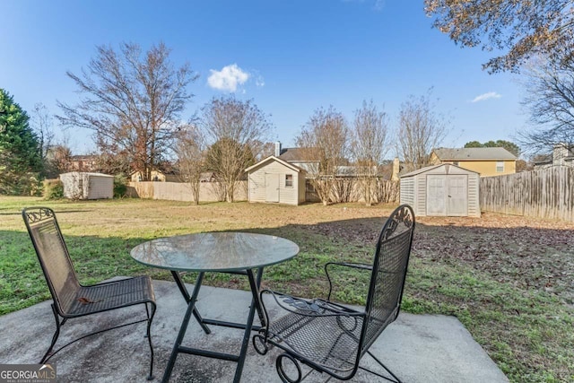 exterior space with a patio area and a storage shed