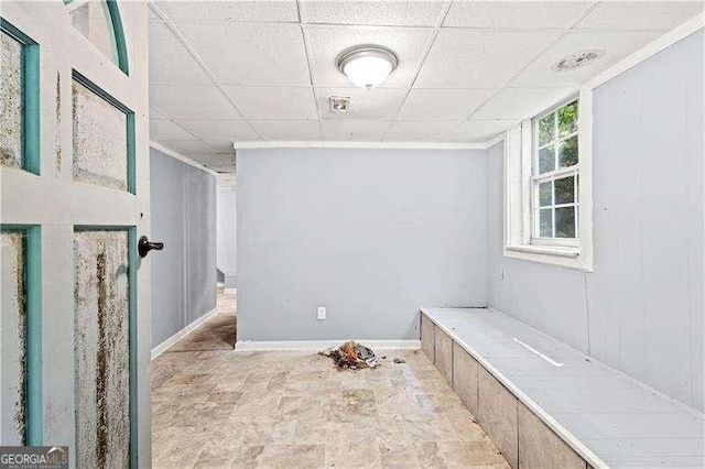 bathroom with a drop ceiling