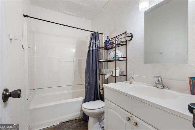 full bathroom featuring toilet, vanity, and shower / tub combo with curtain