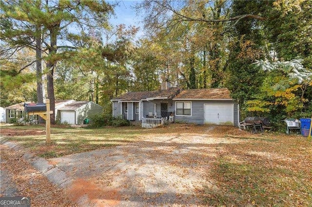 ranch-style home with a garage