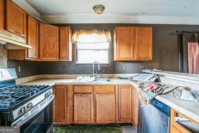 kitchen with sink and appliances with stainless steel finishes