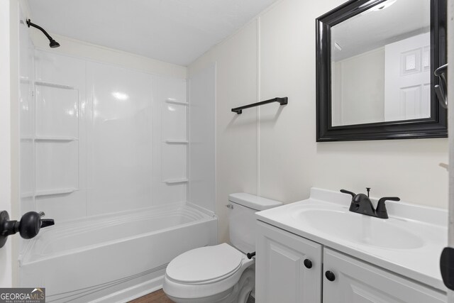 full bathroom featuring shower / bathing tub combination, vanity, and toilet