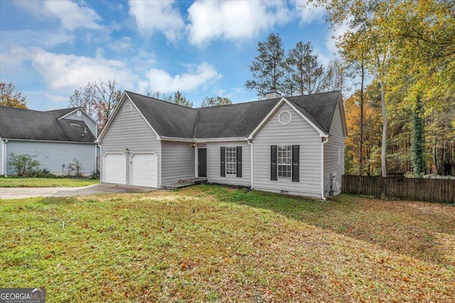 view of front facade featuring a garage and a front yard