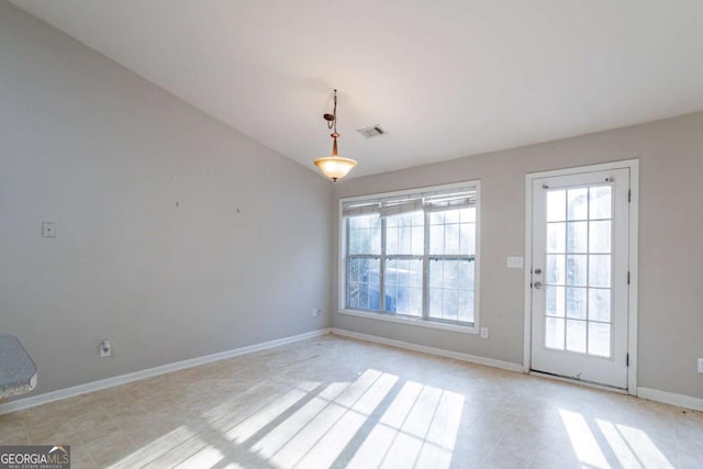 unfurnished dining area with a healthy amount of sunlight