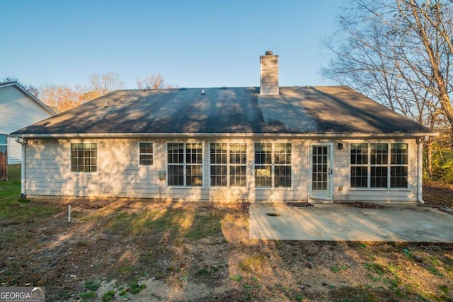 back of house with a patio area