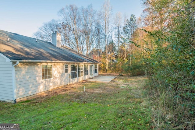 view of yard with a patio area