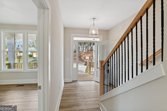 foyer entrance featuring light hardwood / wood-style floors