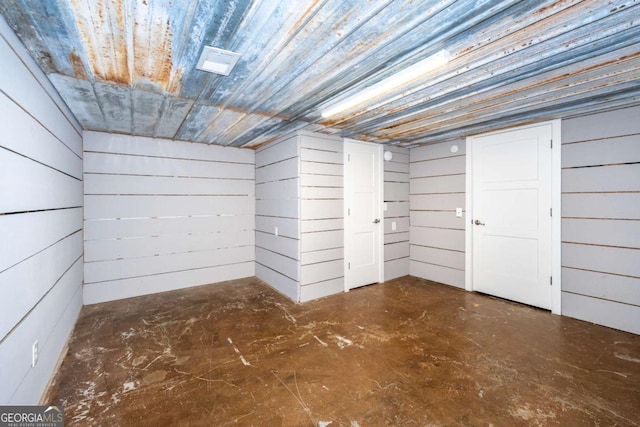 basement with wood walls