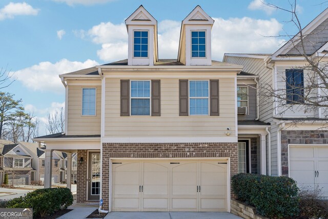 view of front of property featuring a garage