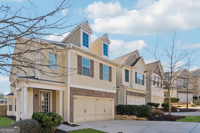 view of side of home featuring a garage