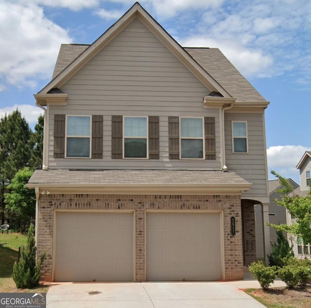 view of front of home with a garage