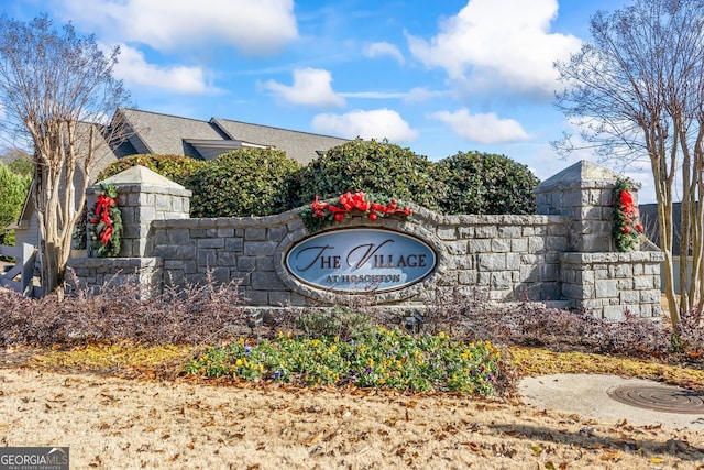 view of community sign