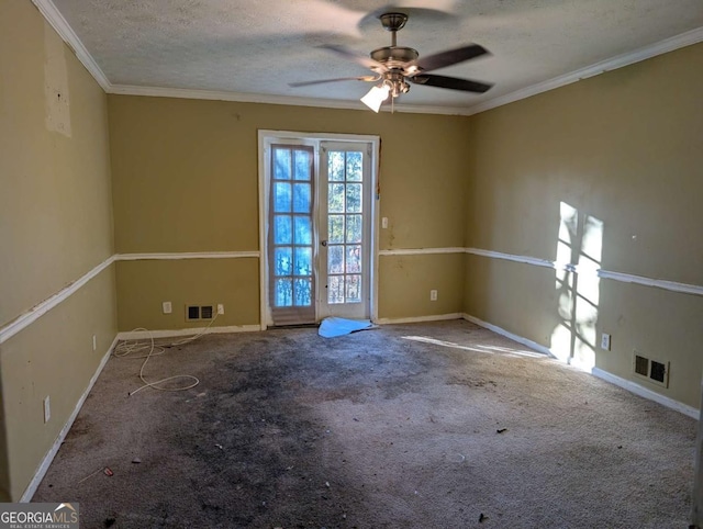 carpeted spare room with french doors, a textured ceiling, ceiling fan, and ornamental molding