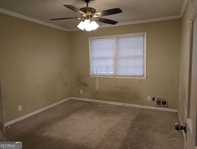 carpeted empty room with a textured ceiling, ceiling fan, and ornamental molding