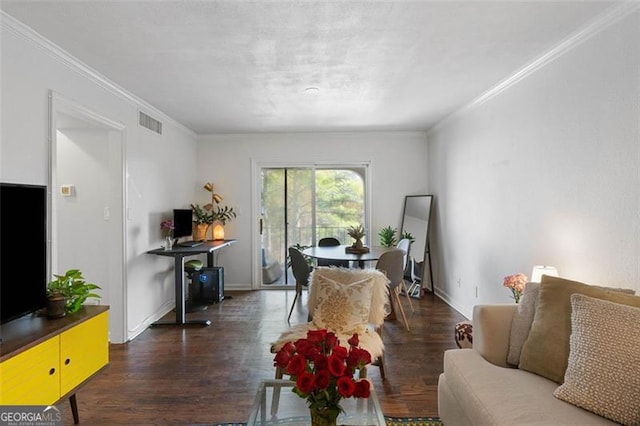 living room featuring dark hardwood / wood-style floors and ornamental molding