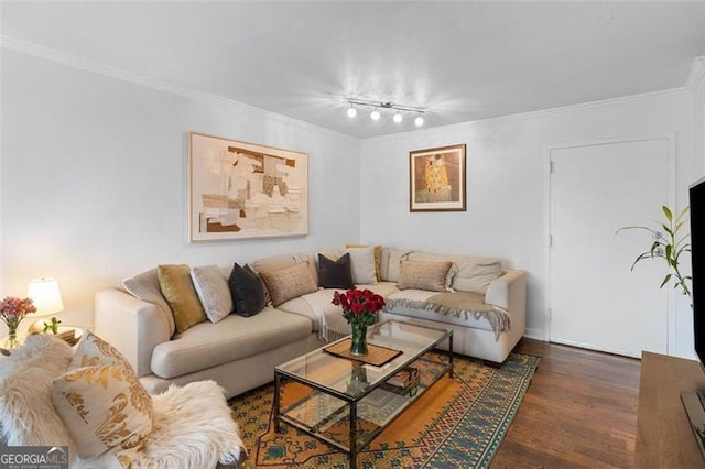 living room featuring dark hardwood / wood-style floors and crown molding