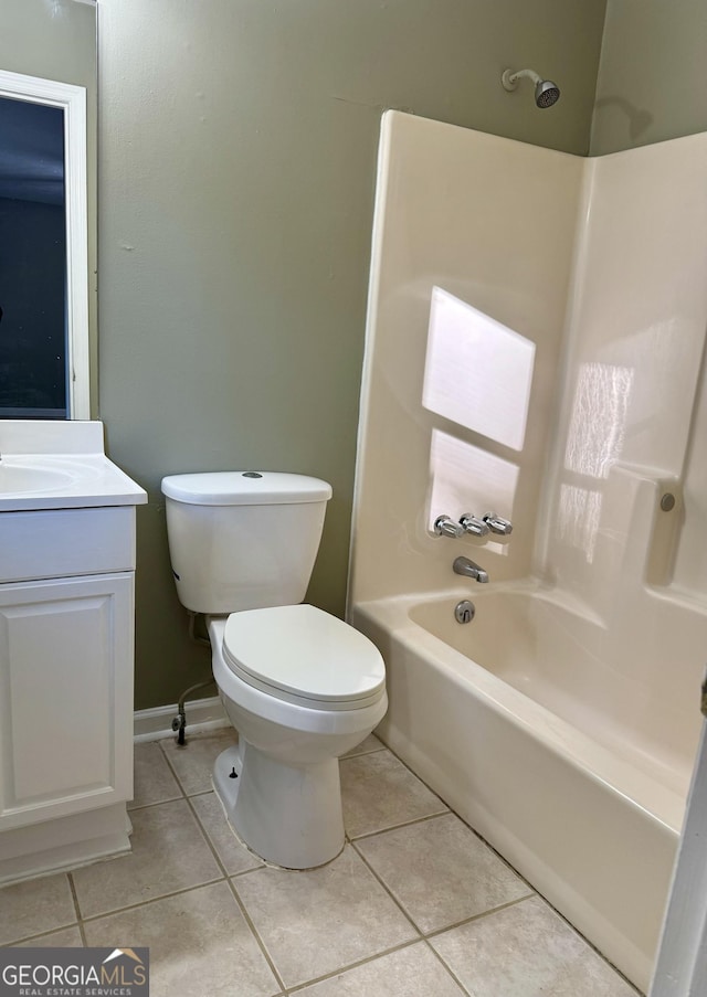 full bathroom with tile patterned flooring, vanity,  shower combination, and toilet