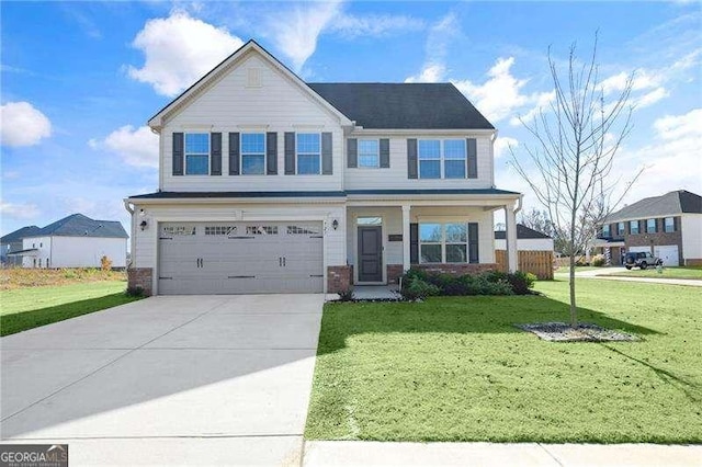 view of front of property featuring a garage and a front lawn