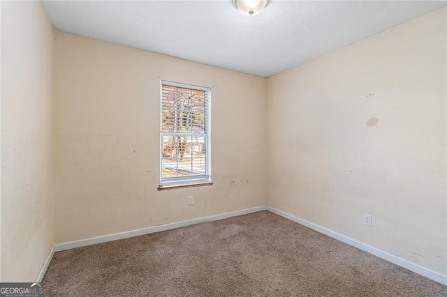 view of carpeted spare room