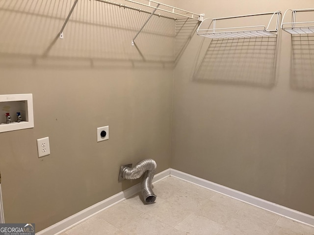 laundry area featuring electric dryer hookup, baseboards, hookup for a washing machine, and laundry area