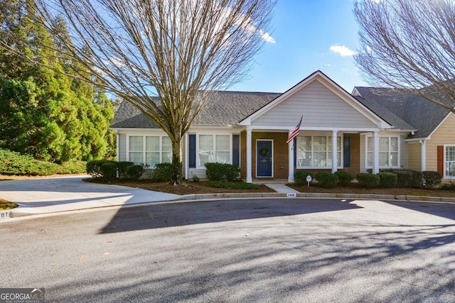 view of front of house with brick siding