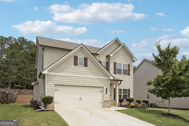 view of front facade featuring central AC unit, a garage, and a front lawn