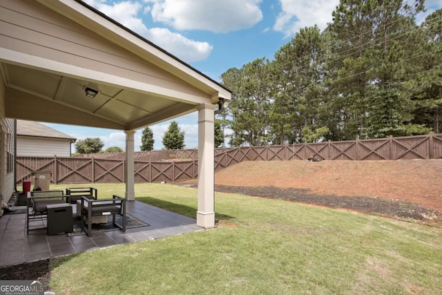 view of yard with a patio area