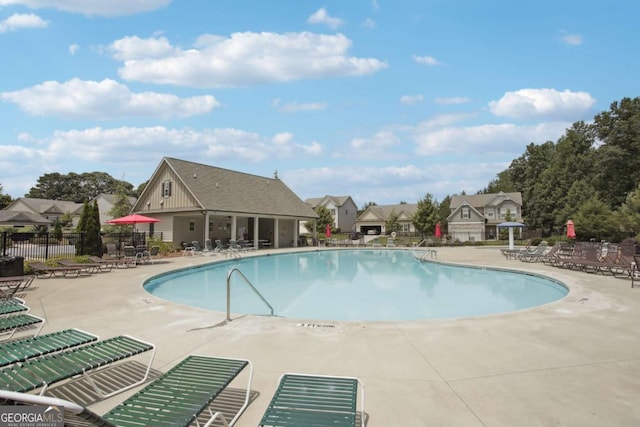 view of pool featuring a patio