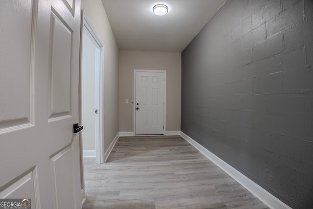 corridor featuring light hardwood / wood-style flooring