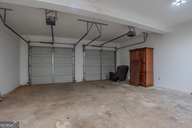 garage featuring a carport and a garage door opener