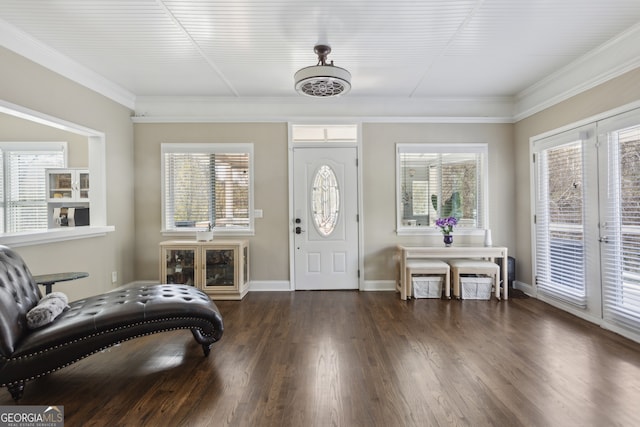 entrance foyer with crown molding, dark hardwood / wood-style flooring, and french doors