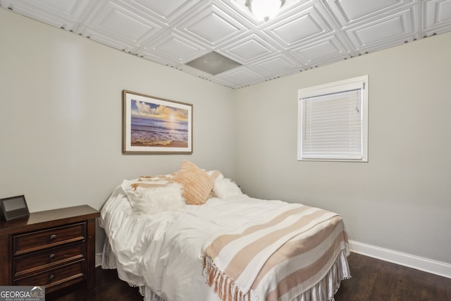 bedroom featuring dark wood-type flooring