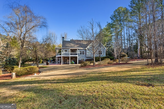 view of front facade featuring a front yard